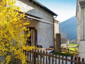 a house with a fence in front of it at Holiday Home Marianne by Interhome in Aquila