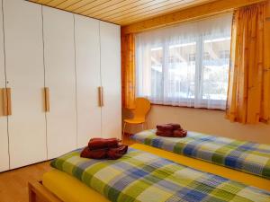 Postel nebo postele na pokoji v ubytování Apartment Oberei by Interhome