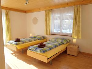 Postel nebo postele na pokoji v ubytování Apartment Oberei by Interhome
