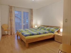 Postel nebo postele na pokoji v ubytování Apartment Oberei by Interhome