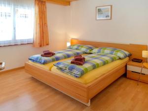 Postel nebo postele na pokoji v ubytování Apartment Oberei by Interhome