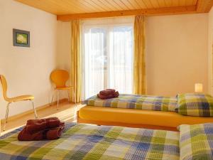 Postel nebo postele na pokoji v ubytování Apartment Oberei by Interhome