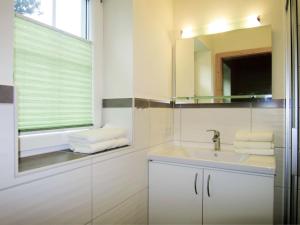 Koupelna v ubytování Holiday Home Siedlerhof by Interhome