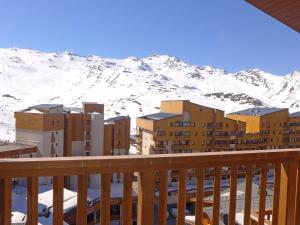 a view of a snowy mountain from a balcony at Apartment La Roche Blanche-11 by Interhome in Val Thorens
