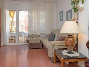 A seating area at Apartment Edificio Garcomar I by Interhome