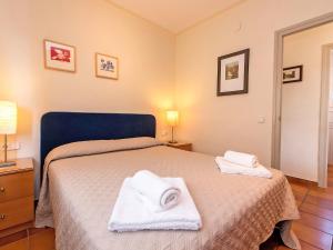 Llit o llits en una habitació de Holiday Home Estiu by Interhome
