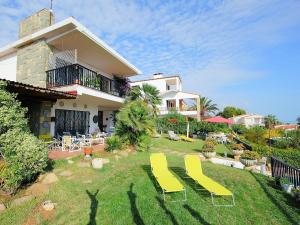 Zahrada ubytování Villa Torre Yato by Interhome
