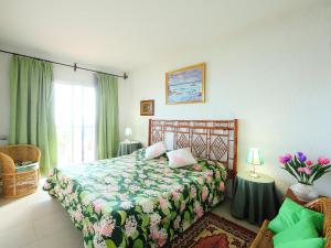 Llit o llits en una habitació de Villa Torre Yato by Interhome