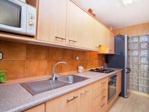 A kitchen or kitchenette at Apartment Edificio Blanqueries by Interhome