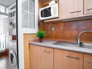 A kitchen or kitchenette at Apartment Edificio Blanqueries by Interhome Még 9 kép