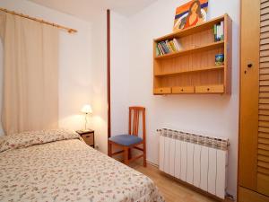 A bed or beds in a room at Apartment Edificio Blanqueries by Interhome