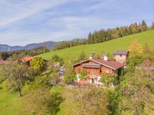 an aerial view of a house on a hill at Holiday Home Oberhaslach by Interhome in Abtenau