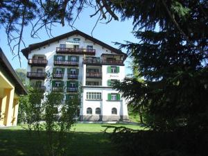 a large white building with balconies on it at Apartment Haus Altein Apartment Nr- 4 by Interhome in Davos