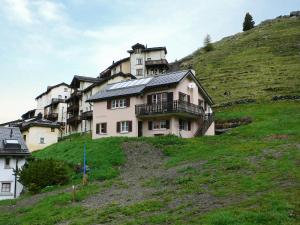 a large house on top of a hill at Apartment Crap Milan by Interhome in Bivio