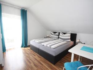 Postel nebo postele na pokoji v ubytování Apartment Ogris-2 by Interhome