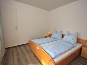 Llit o llits en una habitació de Apartment Ogris-3 by Interhome