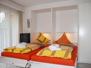 Katil atau katil-katil dalam bilik di Apartment Residenza Lido Appartment 9 by Interhome