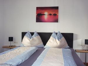 A bed or beds in a room at Apartment Camping Rossbach-1 by Interhome