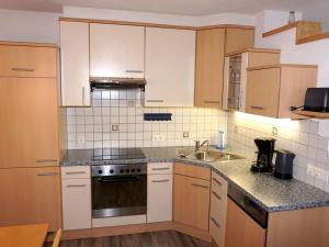 Кухня или кухненски бокс в Apartment Camping Rossbach-1 by Interhome