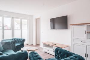 TV a/nebo společenská místnost v ubytování Westwind 2