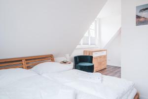 Postel nebo postele na pokoji v ubytování Westwind 2