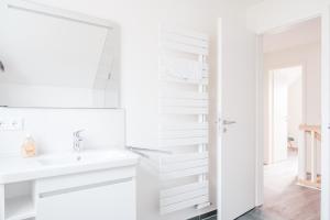 Koupelna v ubytování Westwind 2 + 26 fotografií