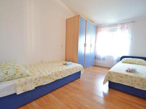 Postel nebo postele na pokoji v ubytování Holiday Home Anđela by Interhome