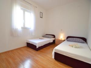 Postel nebo postele na pokoji v ubytování Holiday Home Anđela by Interhome