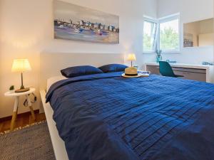 Postel nebo postele na pokoji v ubytování Apartment Cvit 1 by Interhome
