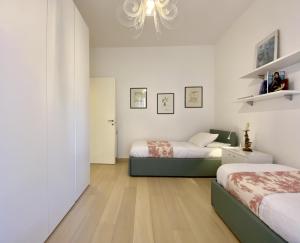 A bed or beds in a room at CasaViva-Lovely Bilo in Santa with AC
