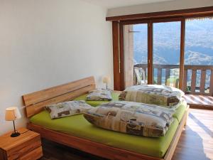 Säng eller sängar i ett rum på Holiday Home Residenza ai Castagni by Interhome