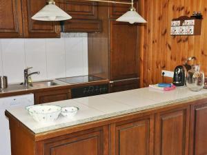 Kuchyň nebo kuchyňský kout v ubytování Holiday Home Rustika by Interhome