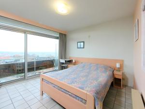 Postel nebo postele na pokoji v ubytování Apartment Residentie Astrid app- 703 by Interhome