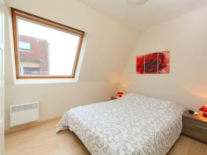 Apartment Residentie Havenhuys-1 by Interhome tesisinde bir odada yatak veya yataklar