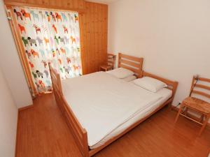 Postel nebo postele na pokoji v ubytování Apartment Fénestral R01 by Interhome