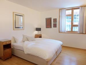 Postel nebo postele na pokoji v ubytování Apartment Residenz Cresta Kulm B26 by Interhome