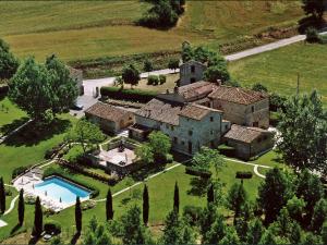 an aerial view of a mansion with a swimming pool at Apartment Forno by Interhome in Rapolano Terme