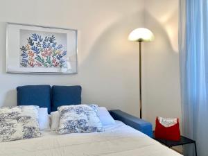 A bed or beds in a room at CasaViva-Lovely Bilo in Santa with AC