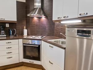 Η κουζίνα ή μικρή κουζίνα στο Holiday Home Toivola 2 by Interhome