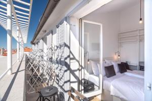Postel nebo postele na pokoji v ubytování Art Hotel Tartini