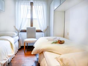 Postel nebo postele na pokoji v ubytování Apartment Chesa Sonnalpine B 52 by Interhome
