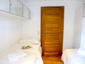 Postel nebo postele na pokoji v ubytování Apartment Chesa Sonnalpine B 52 by Interhome