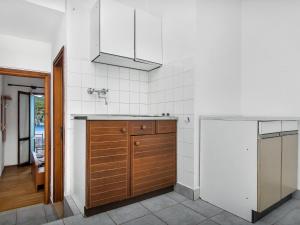 a kitchen with a sink and a counter top at Apartment Cico-8 by Interhome in Selca kod Bogomolja +8 photos