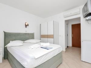 Posteľ alebo postele v izbe v ubytovaní Apartment Rubin-10 by Interhome