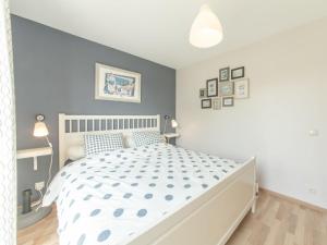 Ένα ή περισσότερα κρεβάτια σε δωμάτιο στο Apartment Sea Garden ground floor with garden by Interhome