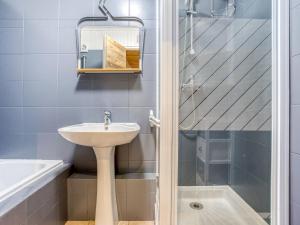 a bathroom with a sink and a shower at Apartment Super Tignes-1 by Interhome in Tignes
