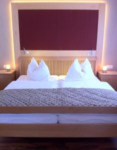 Säng eller sängar i ett rum på Gasthof Teufl