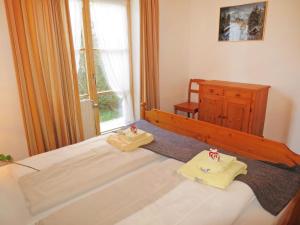 Postel nebo postele na pokoji v ubytování Apartment Wohnung 5 - Am Sonneneck by Interhome
