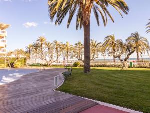 A garden outside Apartment Golf Sant Jordi by Interhome