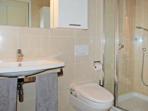 Ванная комната в Apartment Residenza Solemonte by Interhome